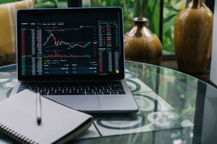 Learning market basics with notes and a laptop